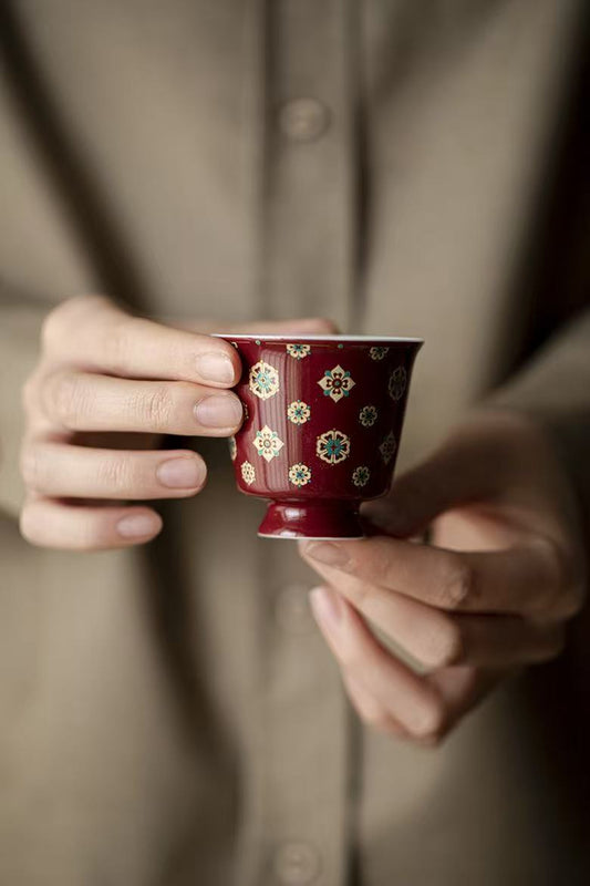 Handmade high-footed teacup with red pipa patterns